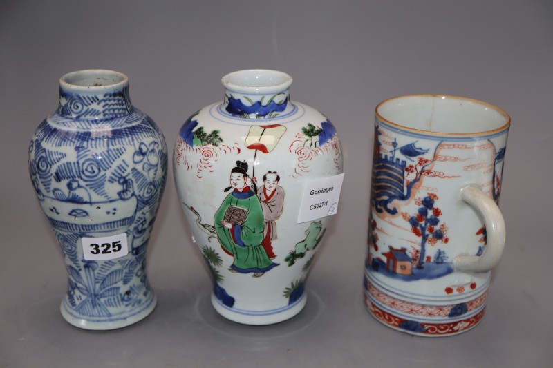 A Chinese famille verte wucai vase, a Chinese blue and white and an Imari mug, tallest 18cm